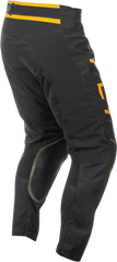 Pantalón Fly Kinetic Center Negro Dorado 2025